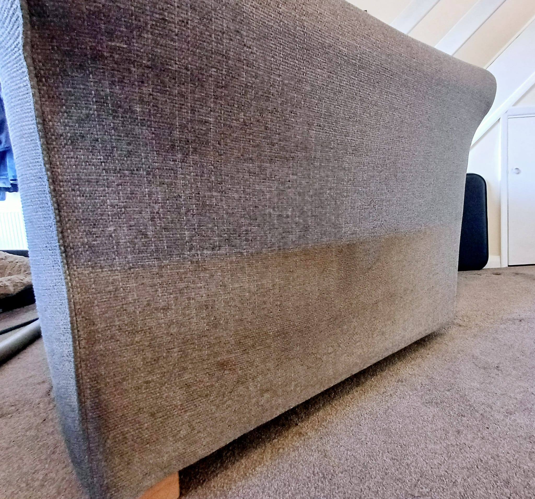 Showing the difference upholstery cleaning makes with a clean section and a dirty section